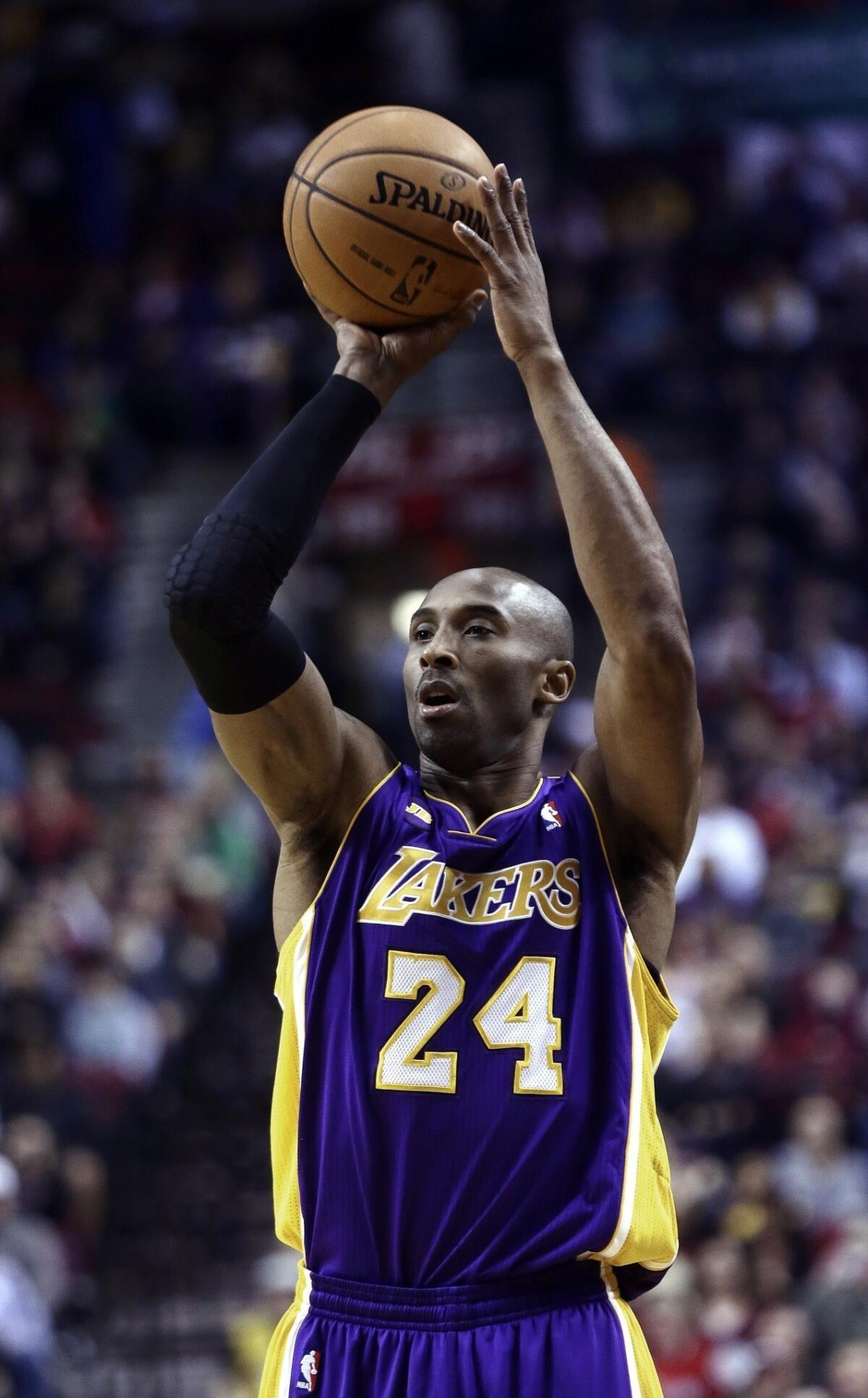 Lakers guard Kobe Bryant pulls up for a jumper against the Trail Blazers on Wednesday night.