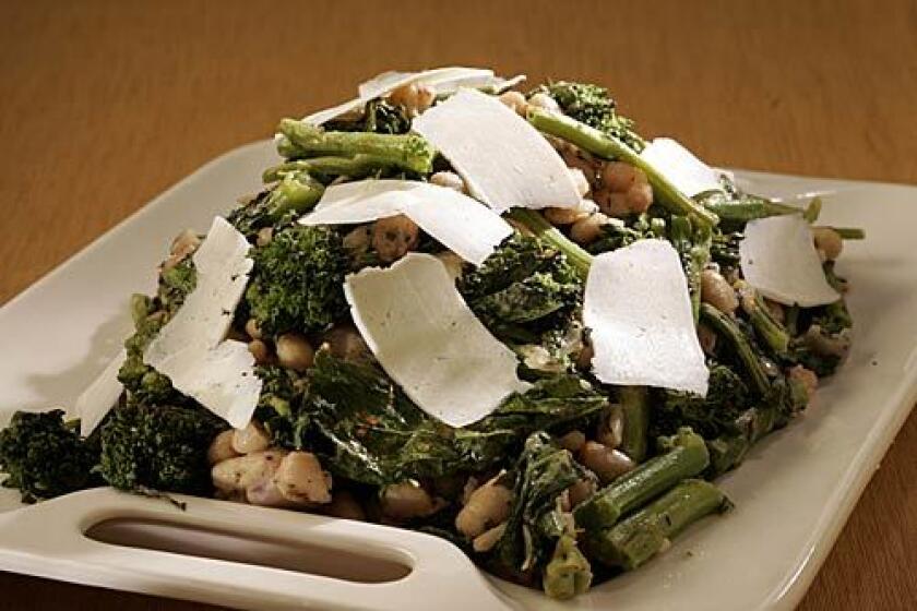 HEARTY: This dinner side dish of roasted broccoli rabe is tossed with salad greens for a lunch next week.