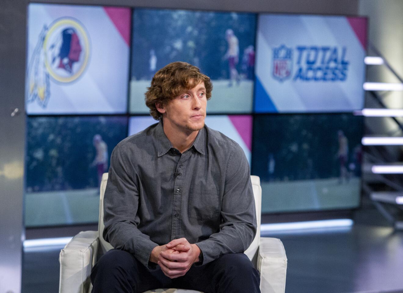 Photo Gallery: Mr. Irrelevant Trey Quinn conducts an interview at the NFL Network