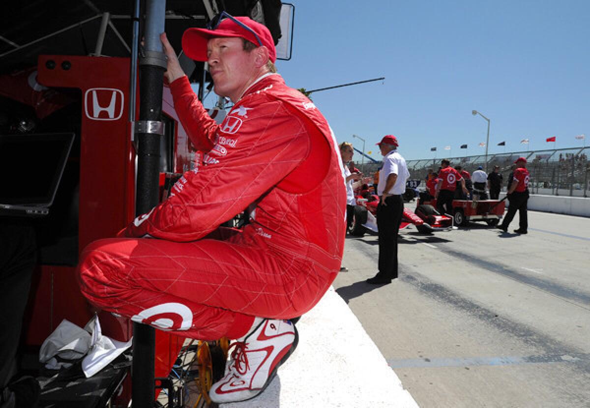 IndyCar driver Scott Dixon relaxes Friday during practice for the Toyota Grand Prix of Long Beach.