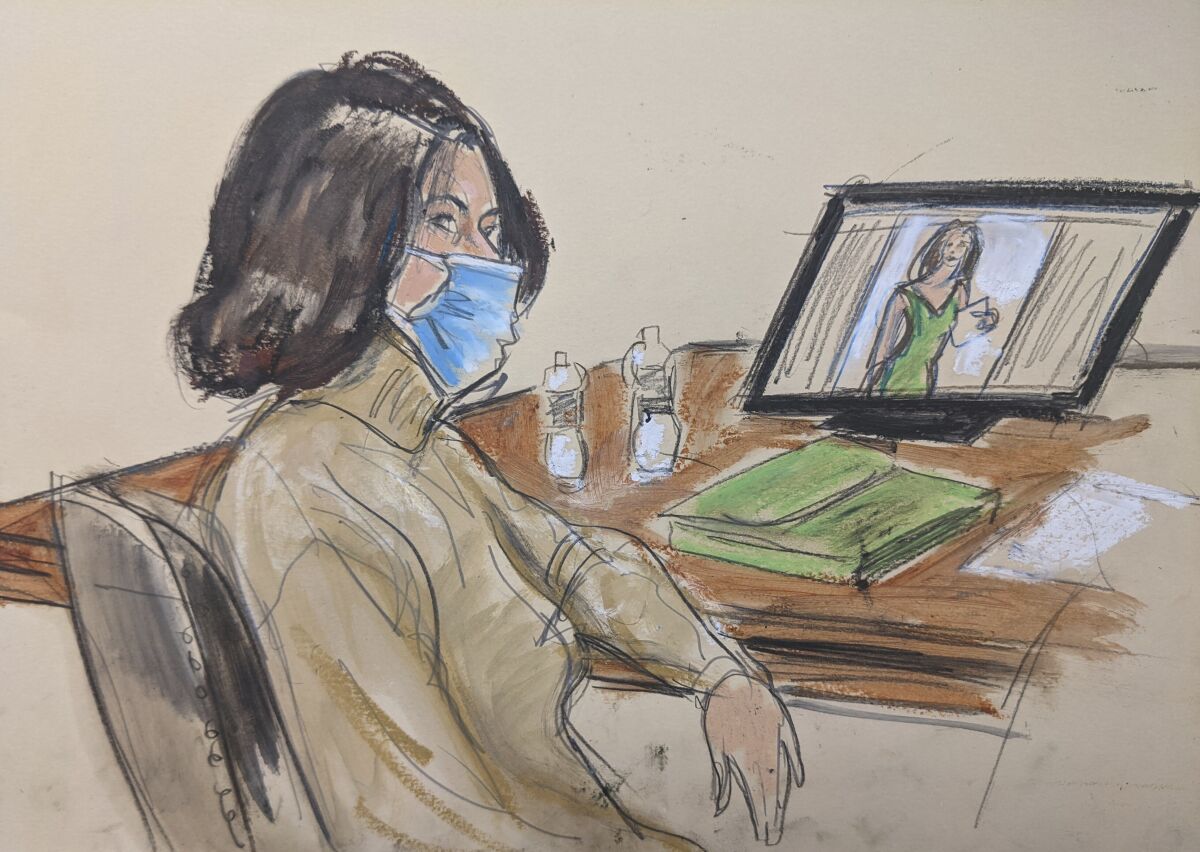 In this courtroom sketch, Ghislaine Maxwell is seated at the defense table while watching testimony of witnesses during her trial, Tuesday, Nov. 30, 2021, in New York. (Elizabeth Williams via AP)