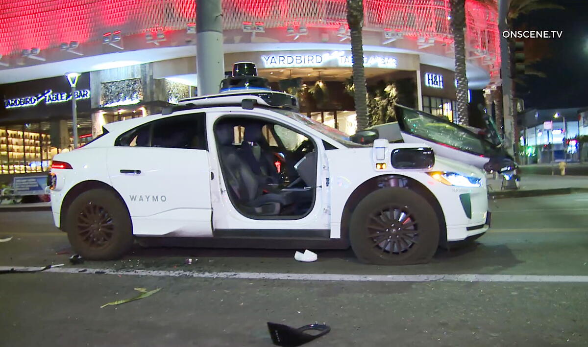 Waymo Destroyed Group vandalizes Waymo robotaxi in Los Angeles' Beverly Grove ...