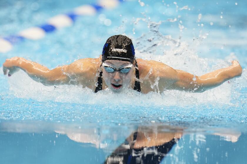 Gretchen Walsh competes in the women's 100-meter butterfly semifinals at the U.S. Olympic swimming trials on Saturday.