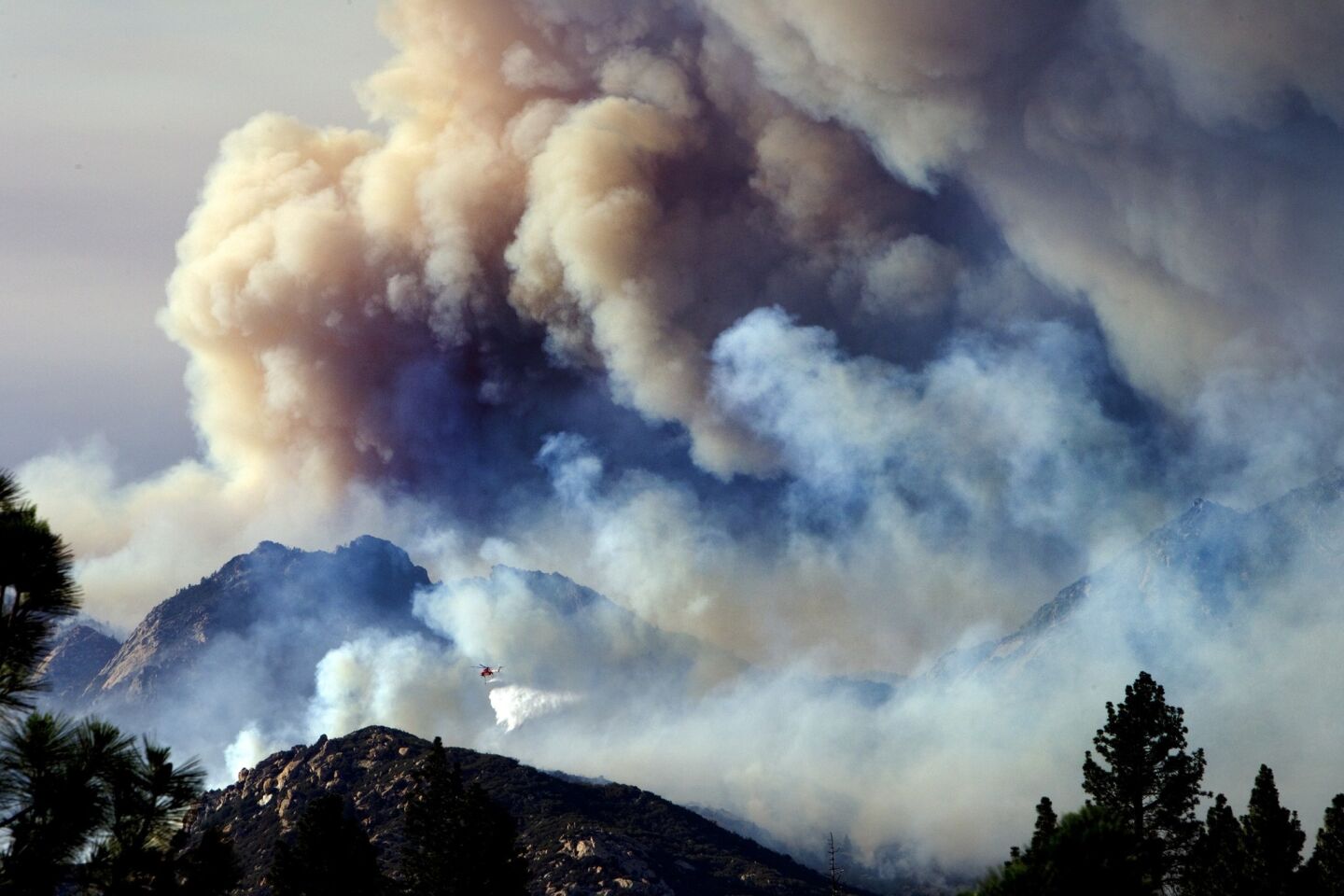The Mountain fire burns out of control, forcing evacuations off Highway 74.