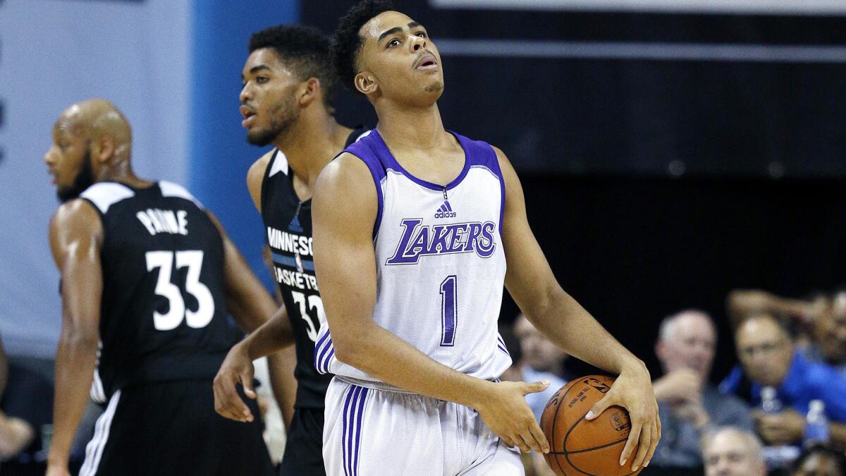 Lakers rookie point guard D'Angelo Russell reacts after the Timberwolves scored during a summer league game in Las Vegas on July 10.