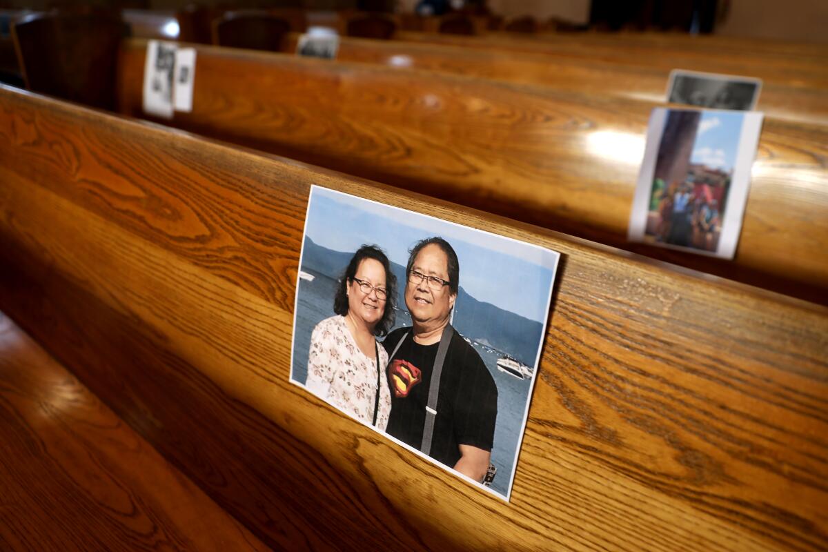 A photo of Henry and Gloria Lucio. The Rev. Ricardo Viveros asked parishioners to send photos of themselves to place in the pews at Holy Trinity Catholic Church in Atwater Village in Los Angeles.