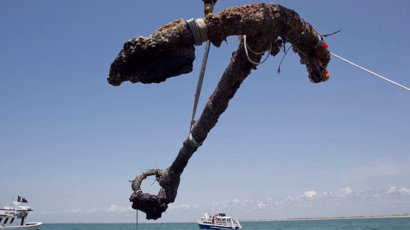 A 3,000-pound anchor from Blackbeard's flagship, Queen Anne's Revenge, is recovered in 2011. The Supreme Court has agreed to hear a case involving videos of the salvage operation.
