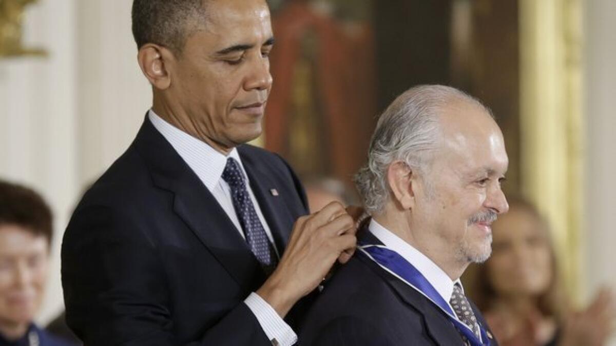 Then-President Barack Obama confers the Presidential Medal of Freedom on UCSD Nobel laureate Mario Molina in 2013.