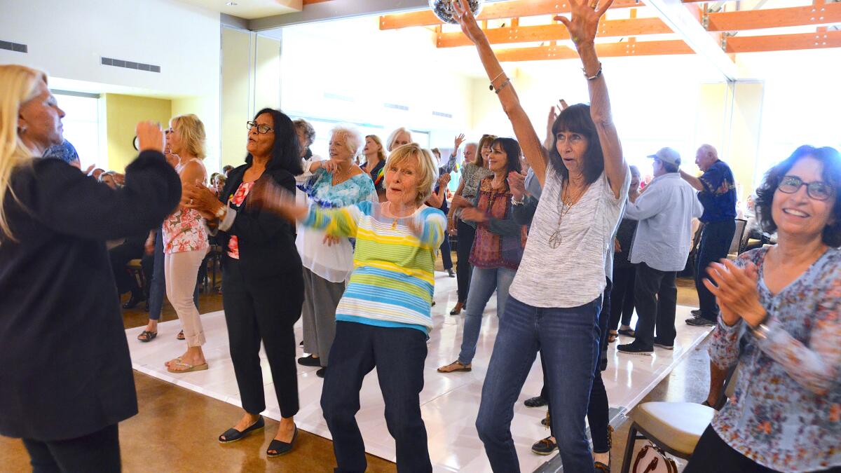 Dancing under the disco ball was the place to be during a past event at OASIS Senior Center.