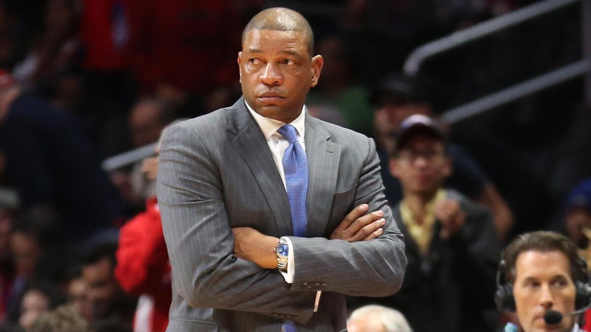 Clippers Coach Doc Rivers watches from the sideline during a win over the New York Knicks on Dec. 31.