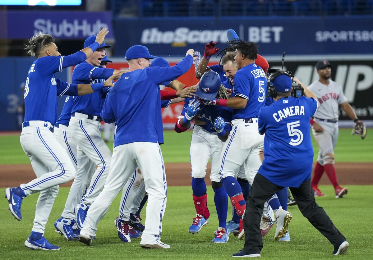 Blue Jays' Springer drives in winning run in 10th inning in