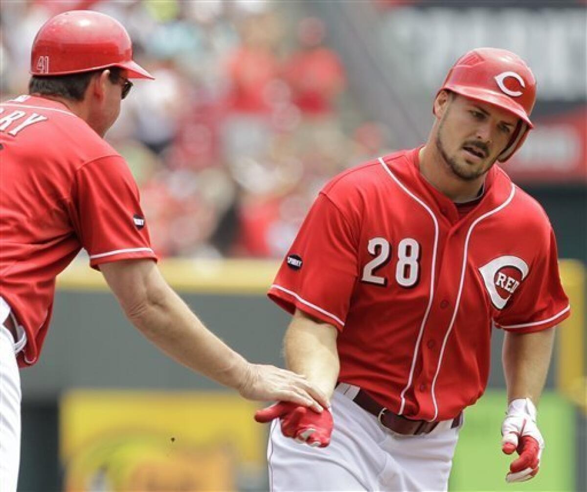 Phillips leads Reds past Indians