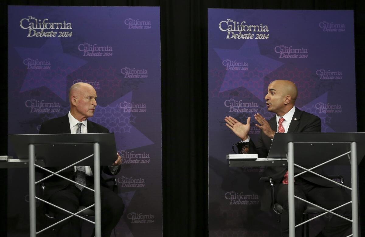 California Gov. Jerry Brown and challenger Neel Kashkari debate in Sacramento.