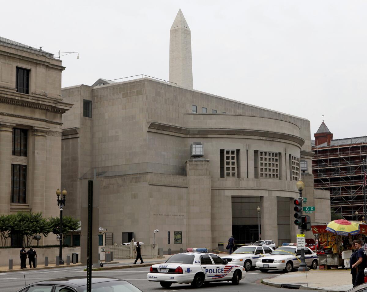 Cars in front of a building in Washington, D.C.