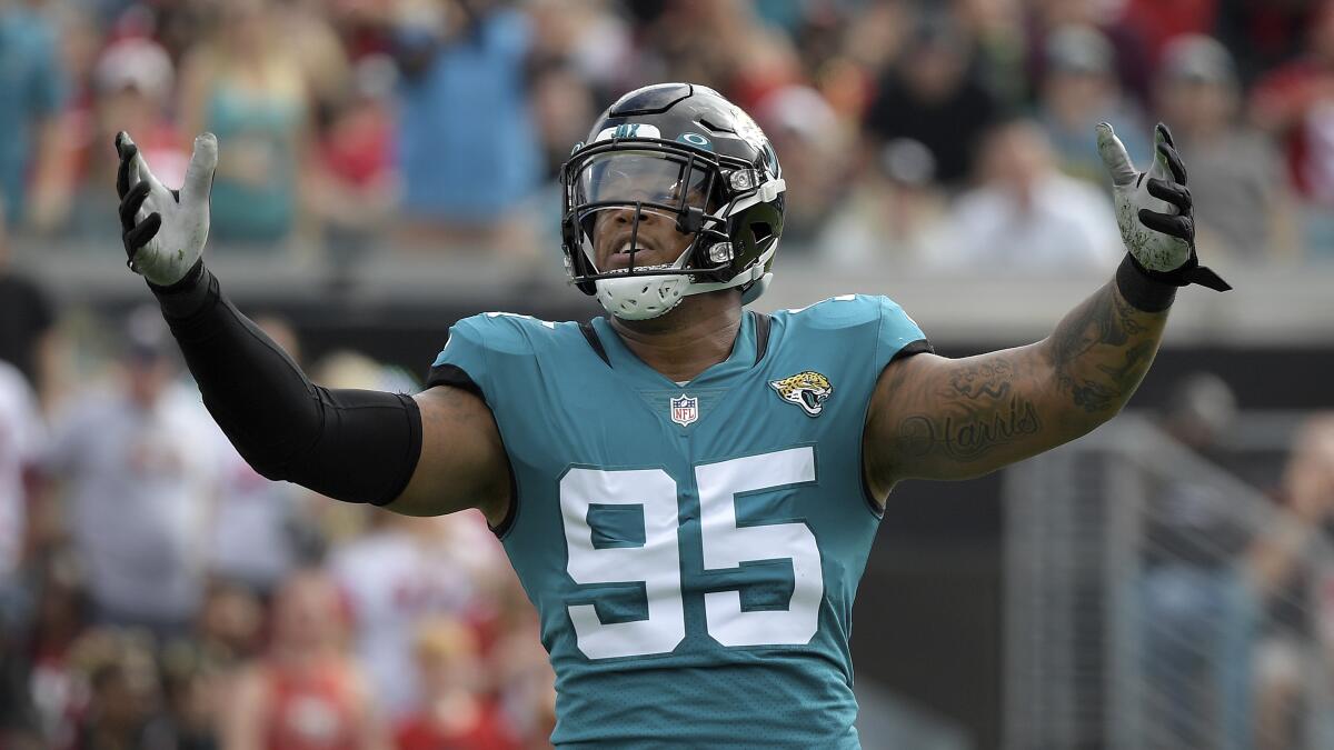 Jacksonville Jaguars defensive end Roy Robertson-Harris celebrates after making a tackle.