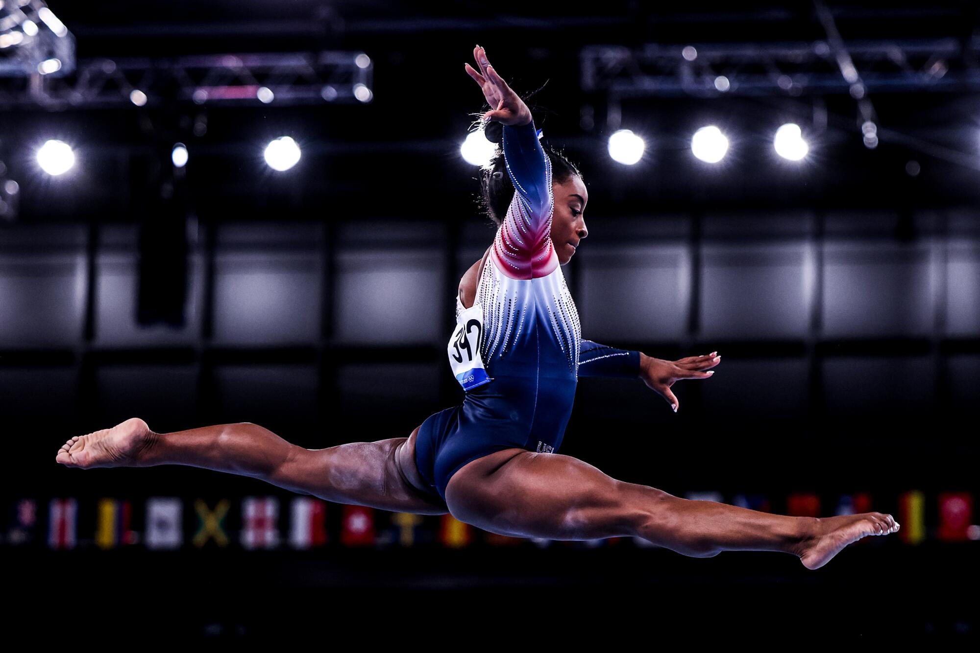 Simone Biles performs on the balance beam at the Ariake Gymnastics Centre in Tokyo.