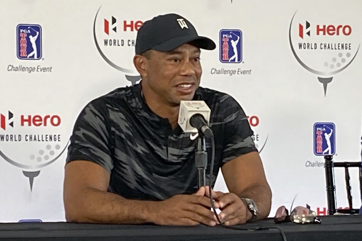 Tiger Woods holds his first press conference since his Feb. 23 car crash 