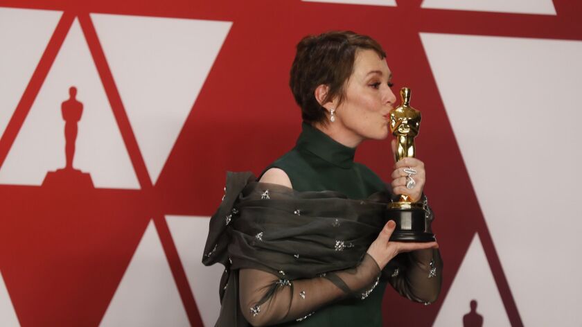 Olivia Colman in the photo room at the Academy Awards on Sunday in Hollywood.