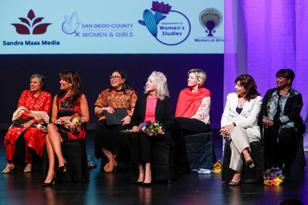 Inductees sit together during the San Diego County Women's Hall of Fame ceremony at the Joan B. Kroc Theatre on Saturday.