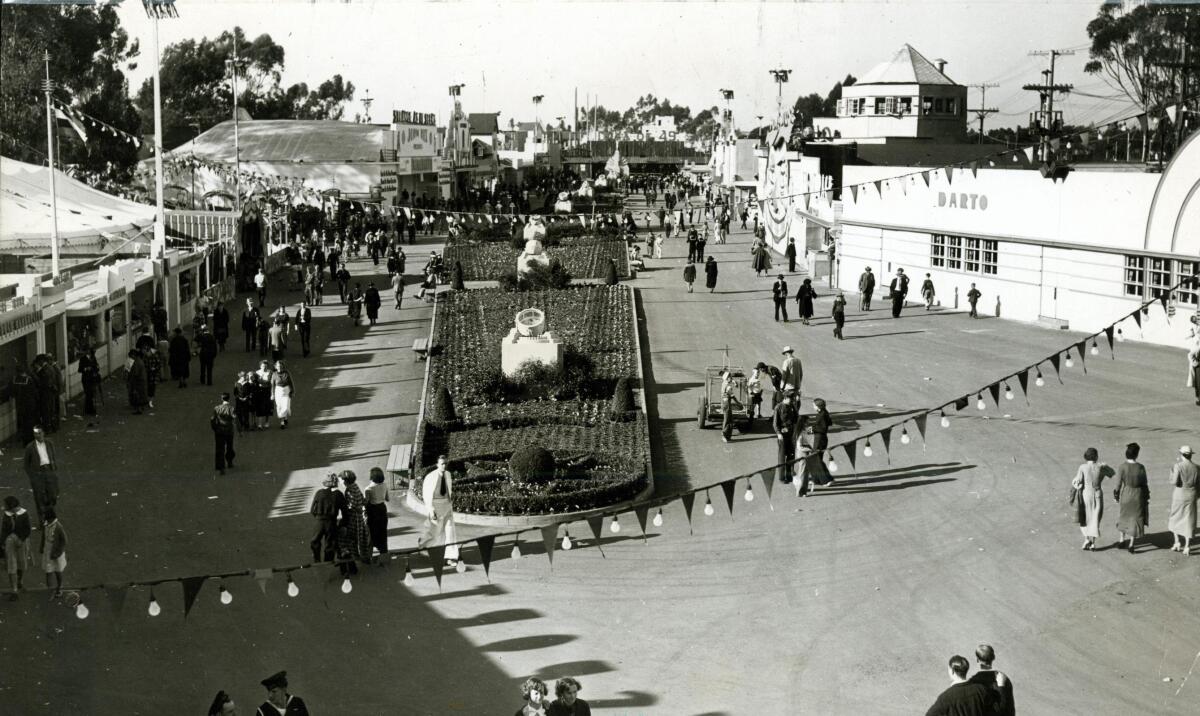 Patrons stroll along the midway of the California Pacific International Exposition in 1935.