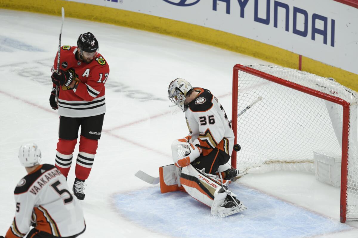 Chicago's Nick Foligno watches Seth Jones' shot go past Ducks goalie John Gibson for a goal in the second period.