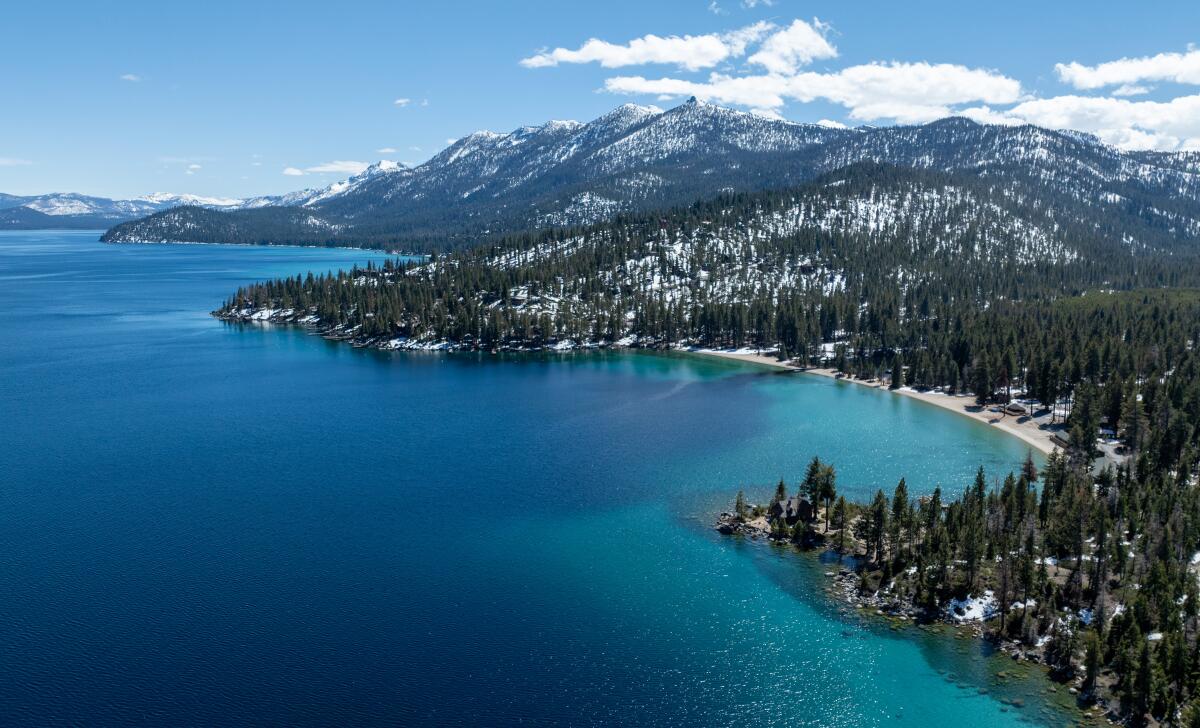 Aerial view from South Lake Tahoe surrounded by snowy mountains