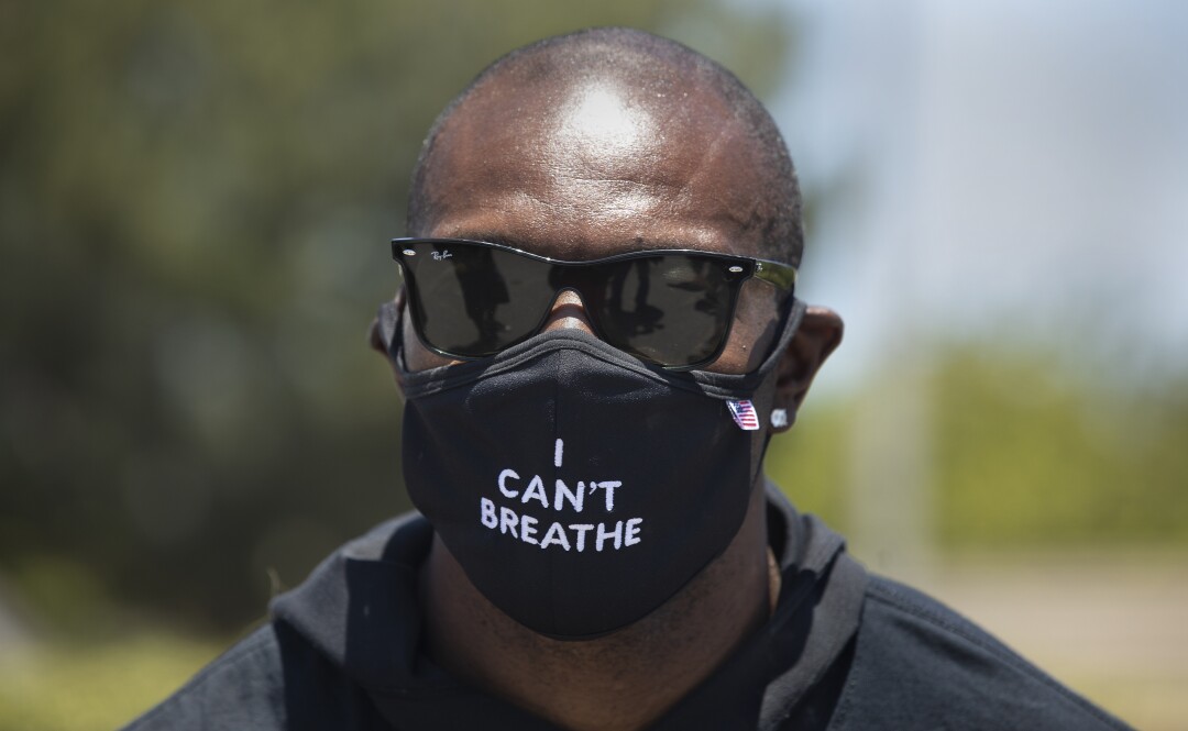 Retired NFL wide receiver and hall of famer Terrell Owens leads a protest outside of SoFi Stadium in Inglewood.