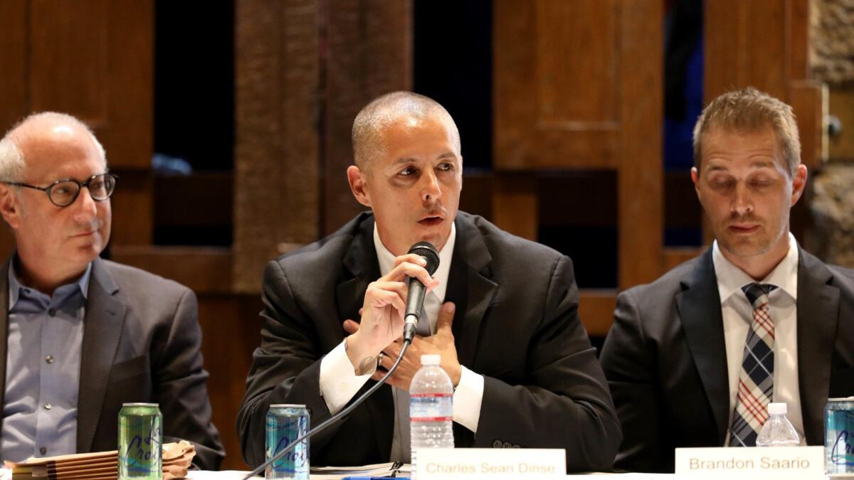 Jeff Daar, Sean Dinse and Brandon Saario discuss issues at the candidates forum held at Temple Ahavat Shalom.