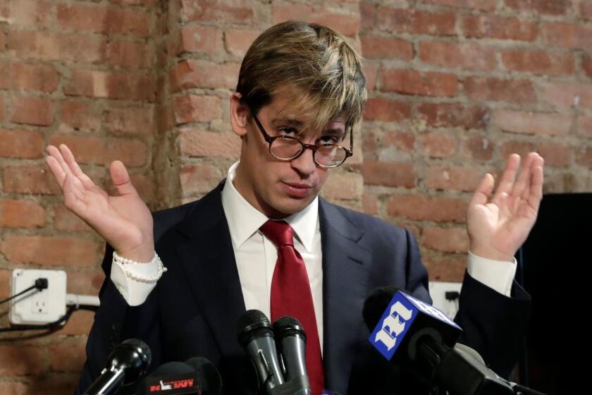 Breitbart senior editor Milo Yiannopoulos addresses the media at a press conference in New York City on February 21.