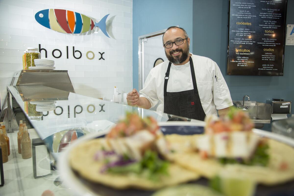 Chef Gilberto Cetina Jr. of Chichen Itza has opened a neighboring seafood stall in Mercado La Paloma and named it Holbox after an island off the Yucatán peninsula.