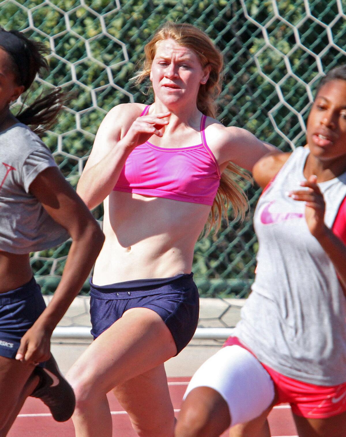 Lizzy Nelson at track and field practice at Glendale College in Glendale on Monday, February 10, 2014.