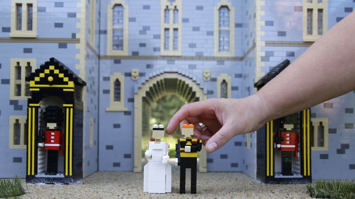 The newest attraction at Legoland in Windsor, England, shows a depiction of the upcoming wedding of Prince Harry and Meghan Markle outside Windsor Castle.