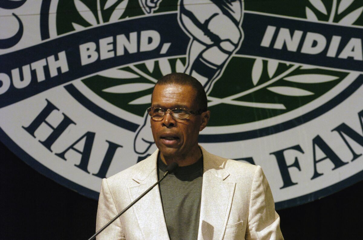 Gale Sayers speaks at a College Football Hall of Fame event June 2, 2004.