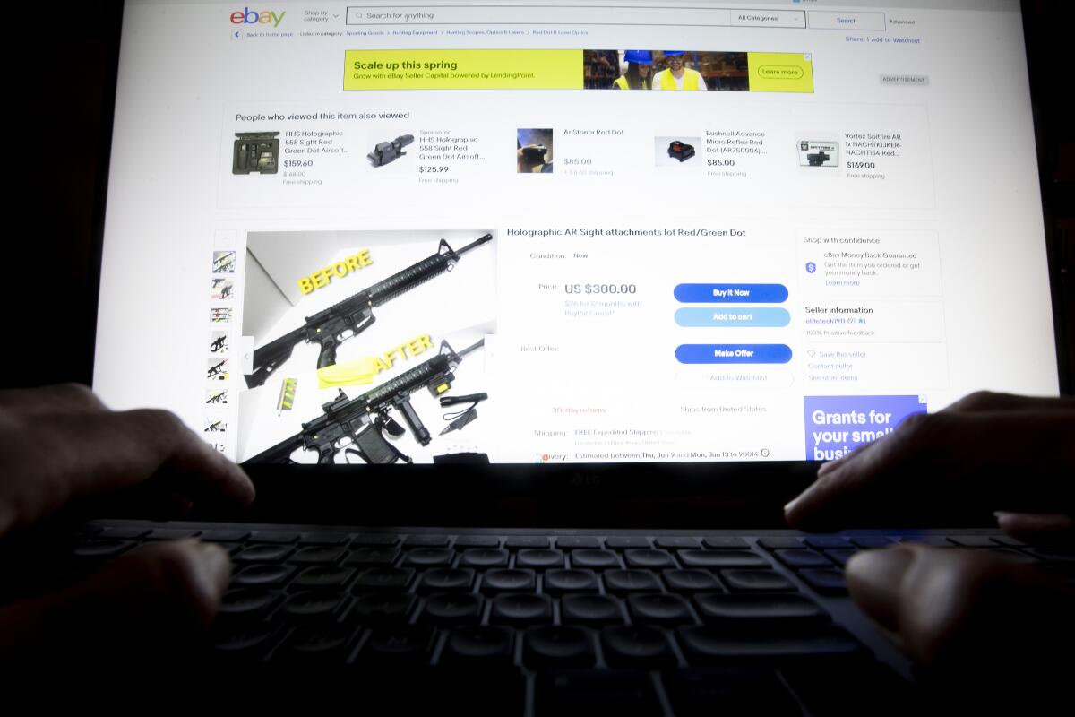 An EBay auction for firearm accessories is shown.