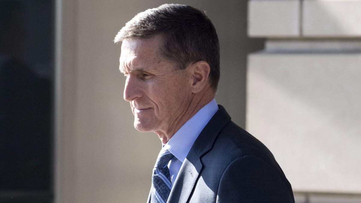 Former national security advisor Michael Flynn leaves the federal courthouse in Washington, D.C., on Dec. 1, after pleading guilty to lying to the FBI.