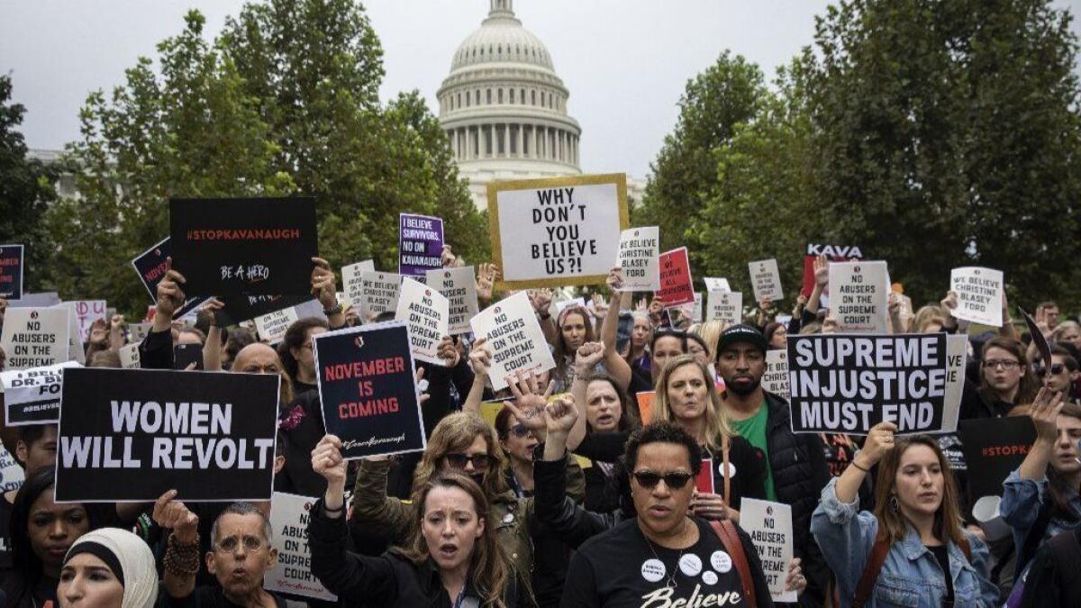 Protestors rally against Supreme Court nominee Judge Brett Kavanaugh in Washington on Sept. 27.