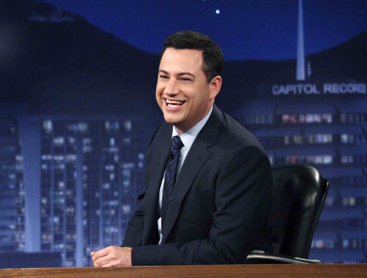 This July 25, 2012 photo released by ABC shows Jimmy Kimmel hosting his late night show "Jimmy Kimmel Live," in Los Angeles.