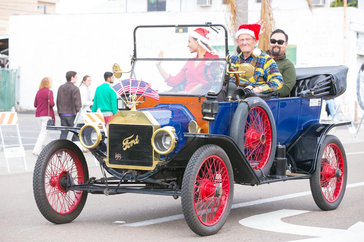 A classic car was driven in a previous Pacific Beach Holiday Parade.
