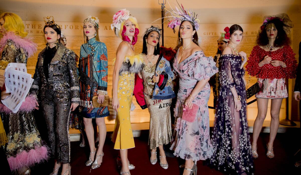 Models line up backstage at Dolce & Gabbana's Alta Moda show at the Metropolitan Opera in New York on April 8.
