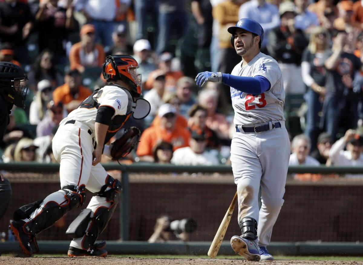 The Dodgers' Adrian Gonzalez reacts after striking out during the 10th inning of an April 23 game against the Giants in San Francisco.