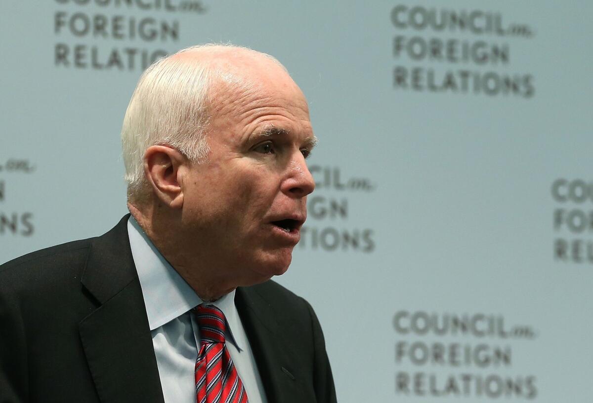 Sen. John McCain (R-Ariz.), shown in Washington this week, lambasted Russian President Vladimir Putin in a commentary published Thursday by the pro-Kremlin Pravda.ru online newspaper. McCain told Russians they deserved better than to be ruled by a corrupt, repressive regime aligned with the world's worst tyrants.