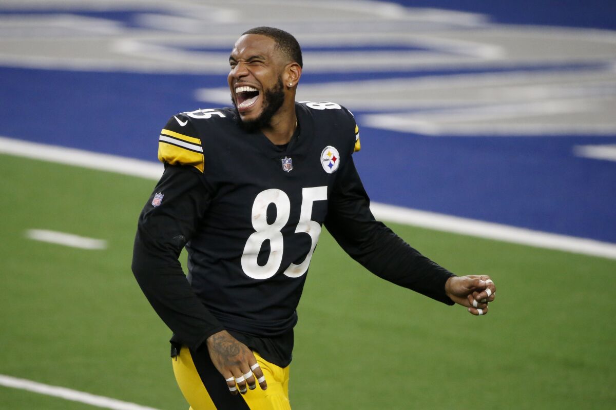 Pittsburgh Steelers' Eric Ebron celebrates after their 24-19 win against the Dallas Cowboys in an NFL football game in Arlington, Texas, Sunday, Nov. 8, 2020. (AP Photo/Michael Ainsworth)