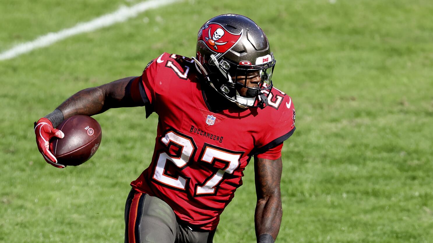 Ke'Shawn Vaughn of the Tampa Bay Buccaneers rushes the ball