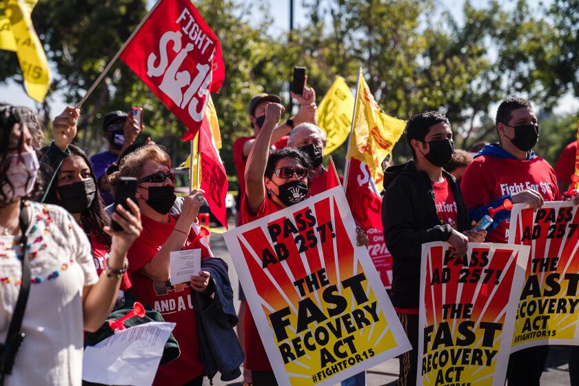 Workers protested for better working conditions and to demand passage of AB 257 at a Burger King in San Diego on Nov. 9, 2021. Photo by Ariana Drehsler for CalMatters