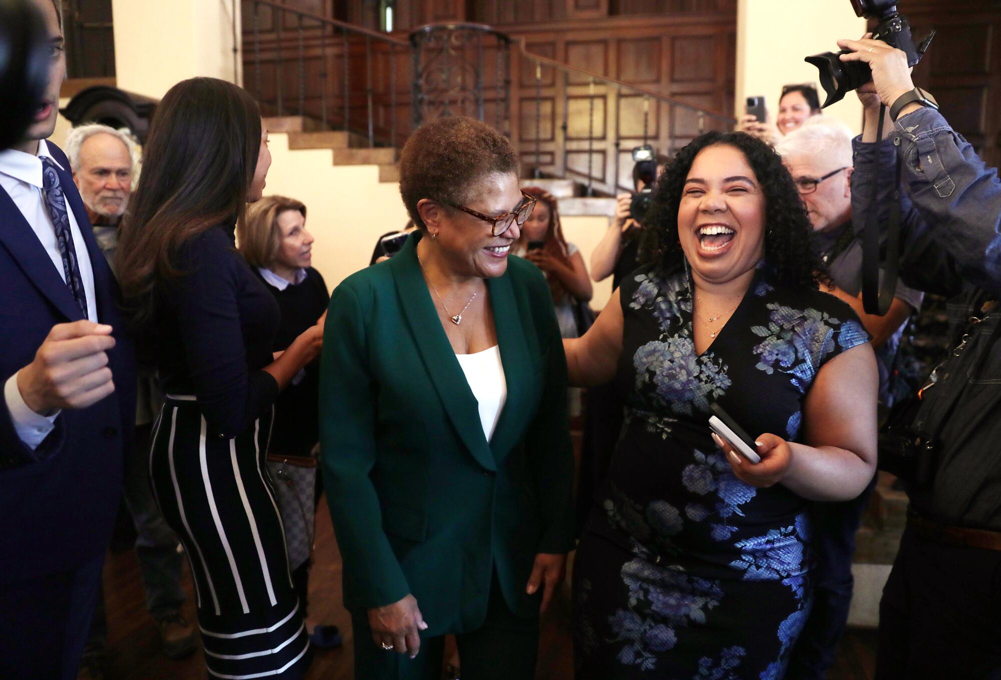 Karen Bass mingles after her election announcement at the Wilshire Ebell Theatre in Los Angeles on Nov. 17.