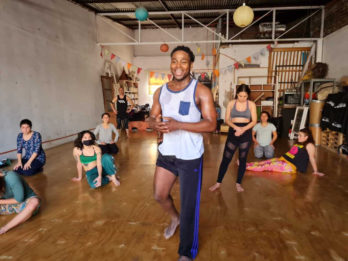 Dancer Evens Clercema teaches students at an academy
