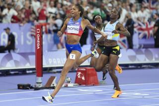 American Gabrielle Thomas celebrates after winning the women's 200-meter final at the 2024 Summer Olympics Tuesday.