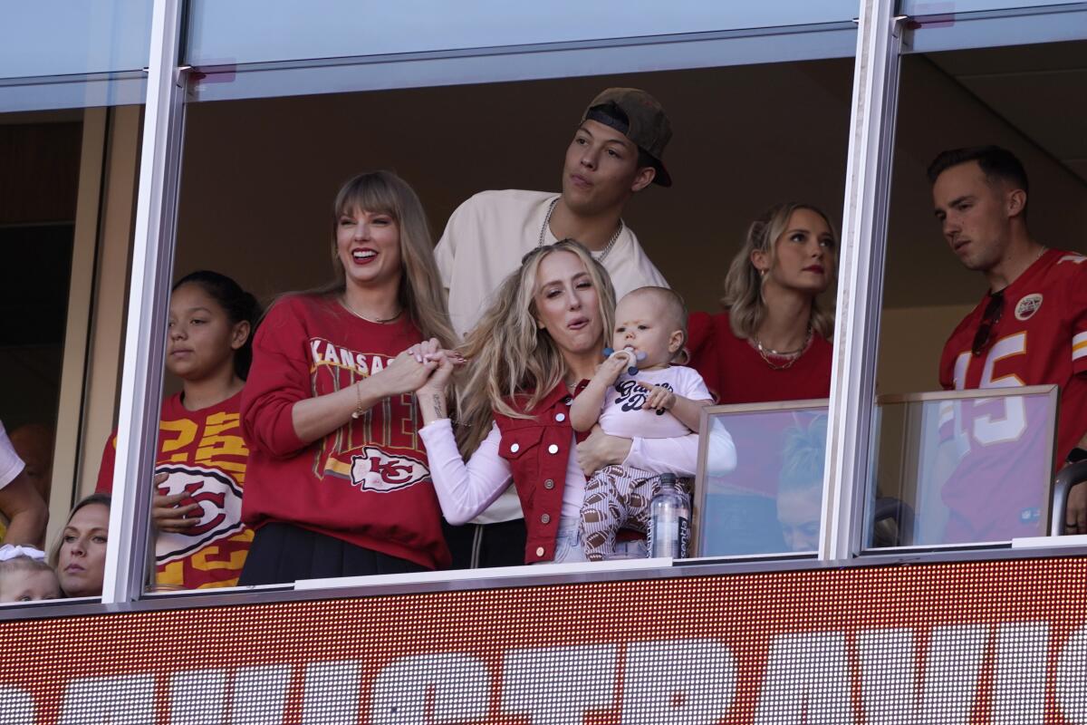 Taylor Swift (left) and Brittany Mahomes celebrate the Chiefs from their seats.