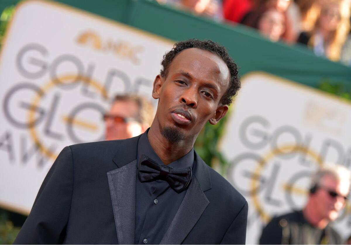 Barkhad Abdi, a supporting actor nominee for "Captain Phillips," arrives at the 71st Golden Globe Awards at the Beverly Hilton on Sunday.
