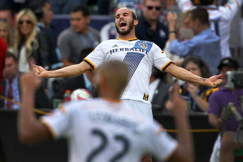 Landon Donovan reacts after the final seconds tick away in the Galaxy's 2-1 victory over the Revolution.